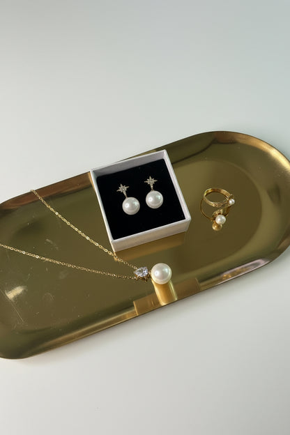 Boucles d'oreilles Élodie – Étoile dorée pavée de strass & perle nacrée