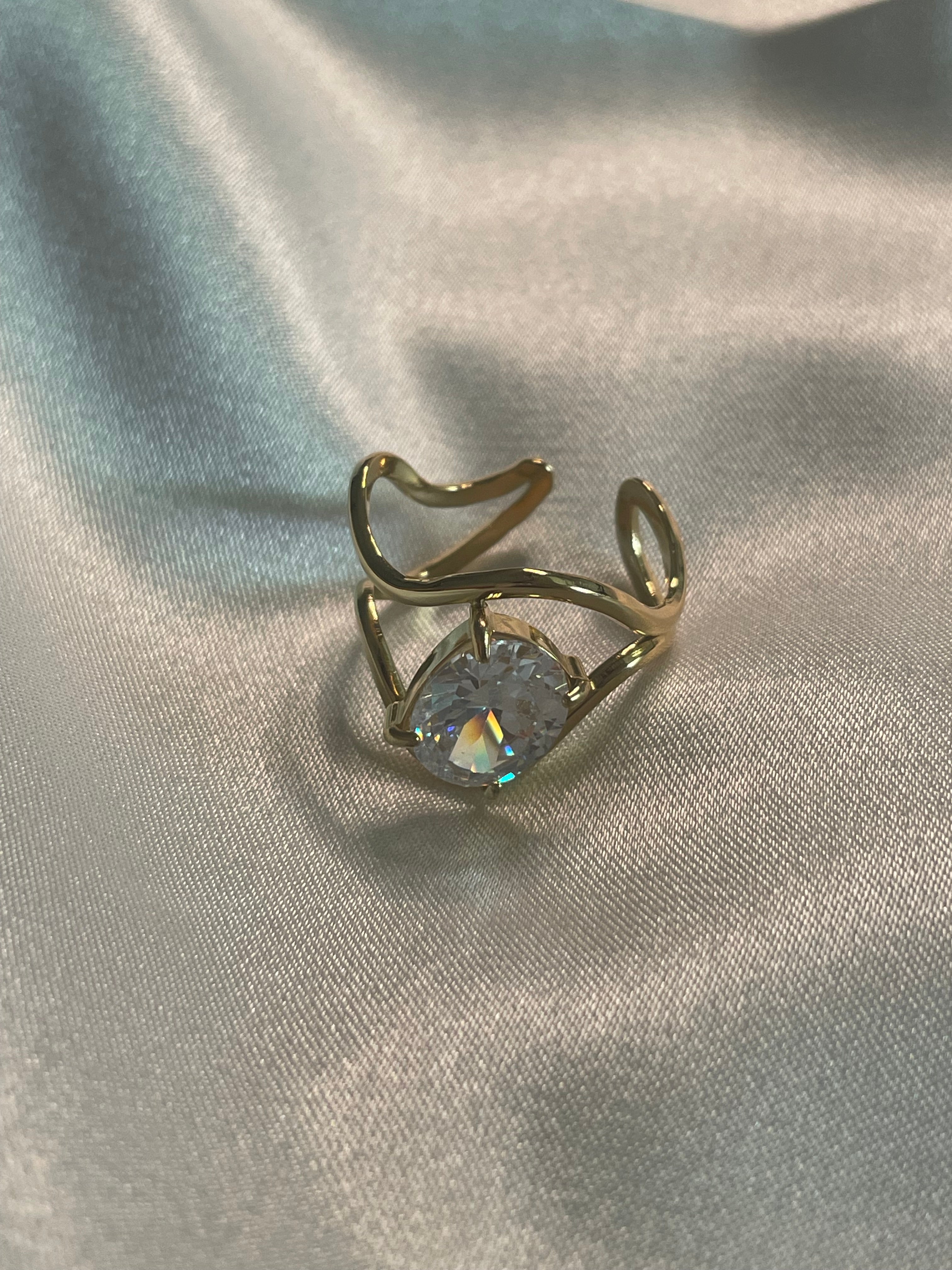 Bague Dorée Double Courbes Avec Strass Ovale.