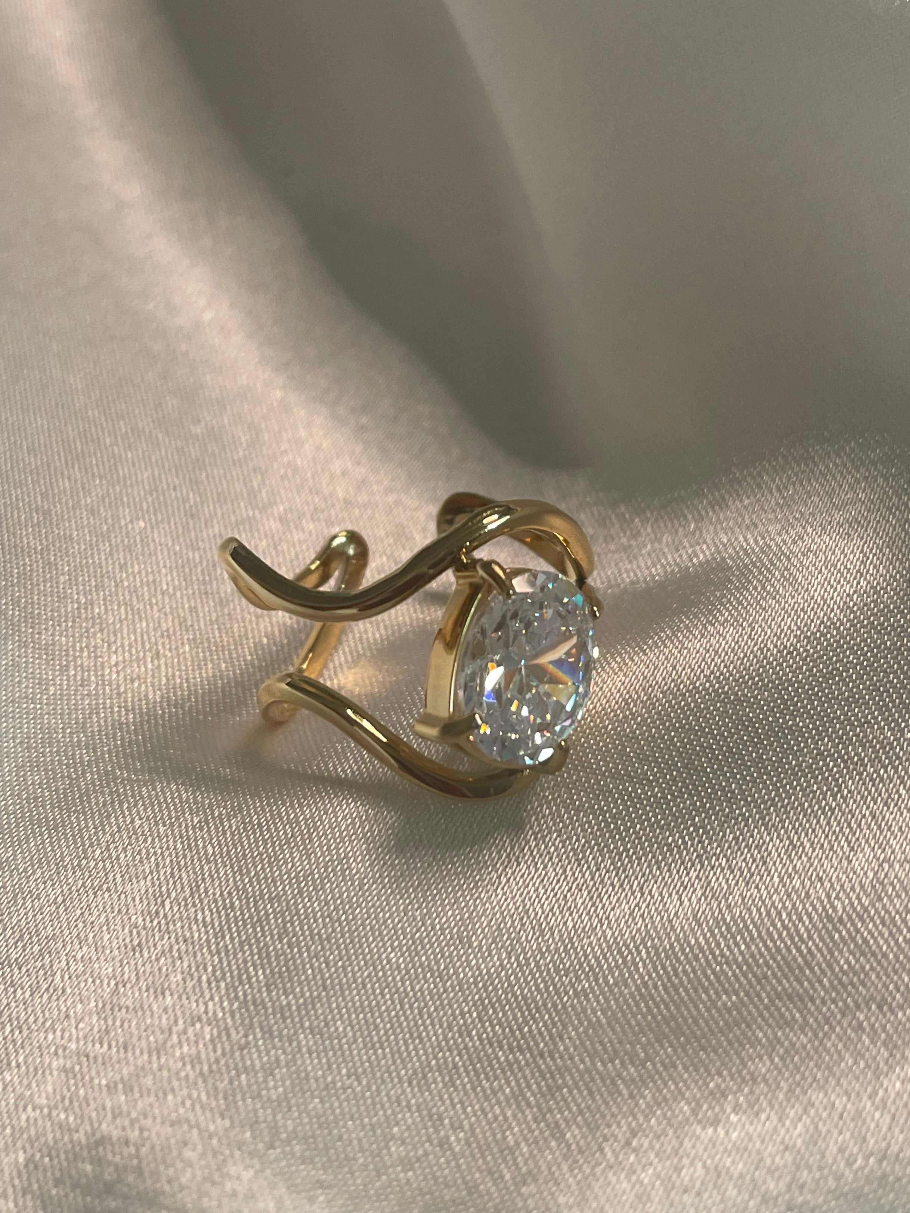 Bague Dorée Double Courbes Avec Strass Ovale.