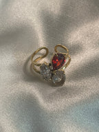 Bague Dorée Avec Strass Clair Et Rouge