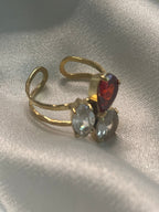 Bague Dorée Avec Strass Clair Et Rouge