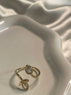 Bague Dorée Spirale Fleur Et Feuille Avec Strass