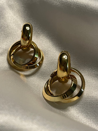 Boucles d'Oreilles Dorées Créoles Epaisses Avec Deux Anneaux.