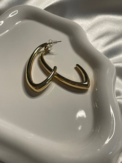 Boucles d'Oreilles Créoles Dorées Courbées
