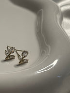 boucles d'oreilles dorées à puces fleurs