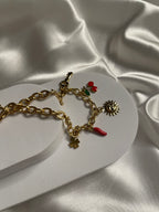 Collier doré maille avec pendentif soleil et cerise