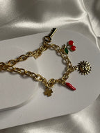 Collier doré maille avec pendentif soleil et cerise