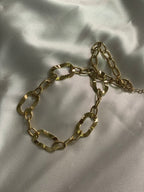 Collier Doré Chaîne de Maillons Ovales Avec Cinq Anneaux Ondulés