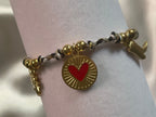 Bracelet Doré Tressé Avec Pendentifs Soleil Cœur Et Botte