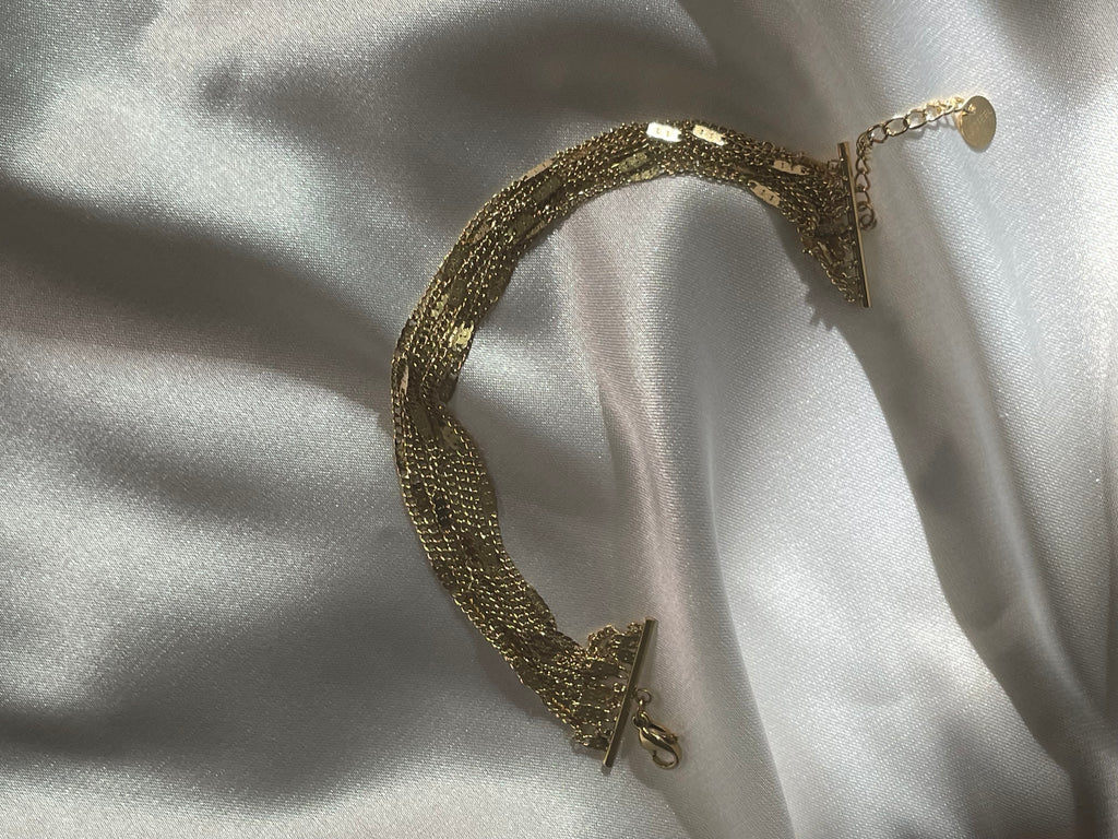 
Bracelet doré avec multi chaînes reliées
